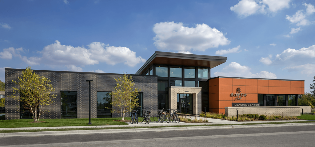 a brick building with bikes parked in front of it