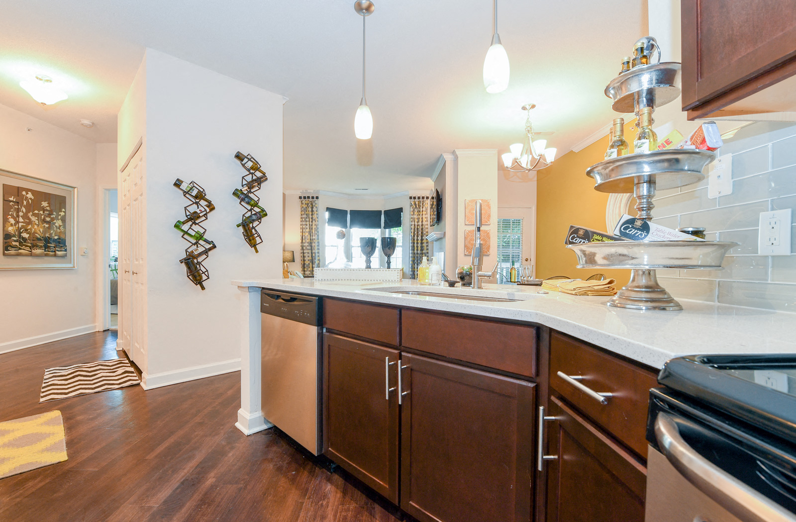 a kitchen with wooden cabinets and a counter top