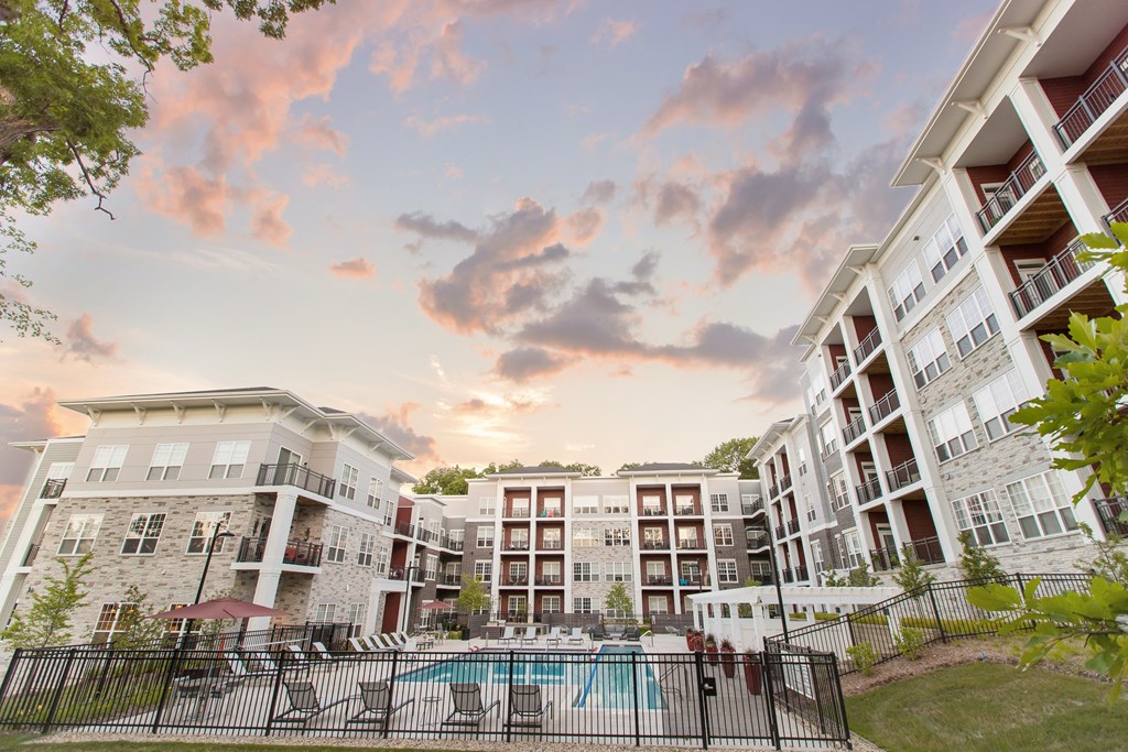 Fenced-in pool area of Brookfield Reserve during sunset.