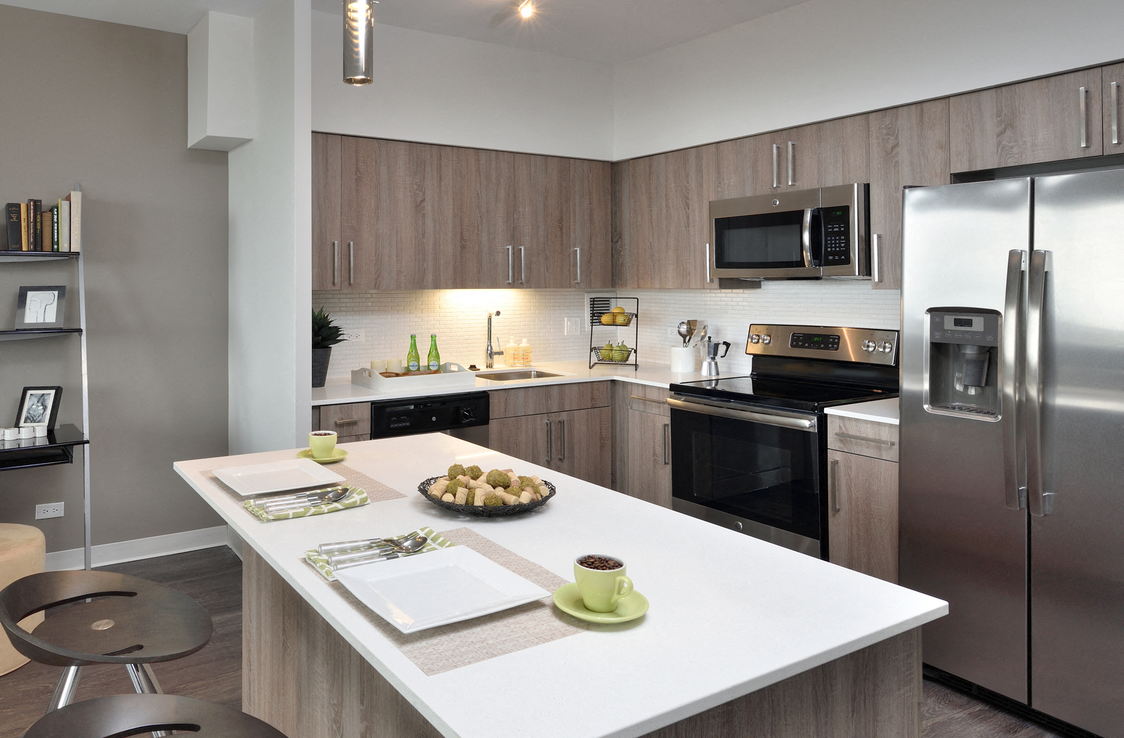 Apartments in West Loop - SCIO at The Medical District Large Kitchen with Stainless Steel Appliances, Kitchen Island, and Plenty of Cabinet Storage Space
