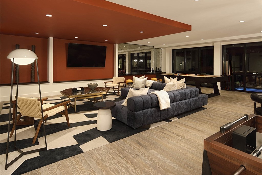 a living room with a couch and a table