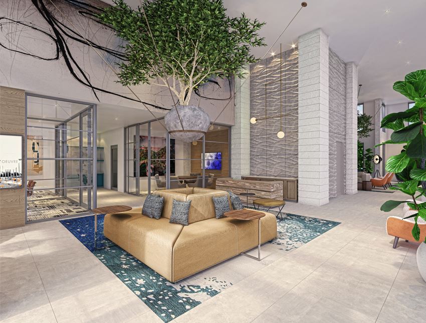 a living room with a couch and a tree in the middle