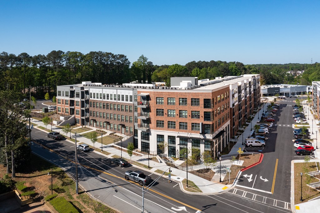 an aerial view of a building in a city street