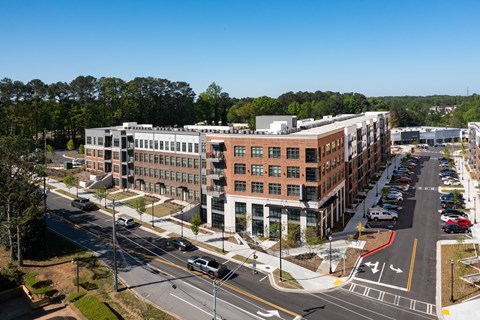 an aerial view of a building in a city street