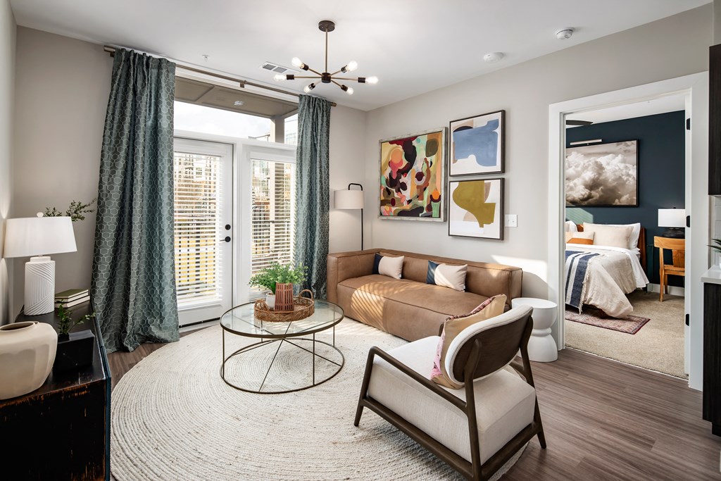 a living room with a couch and a table