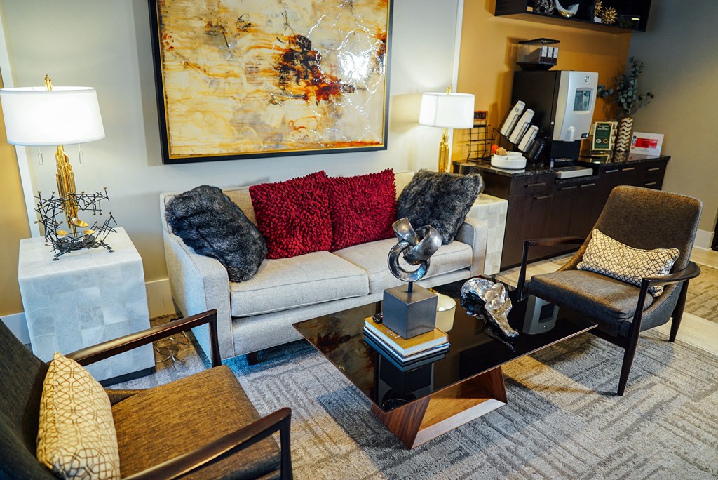 Community area with multiple seating options and a coffee bar. 