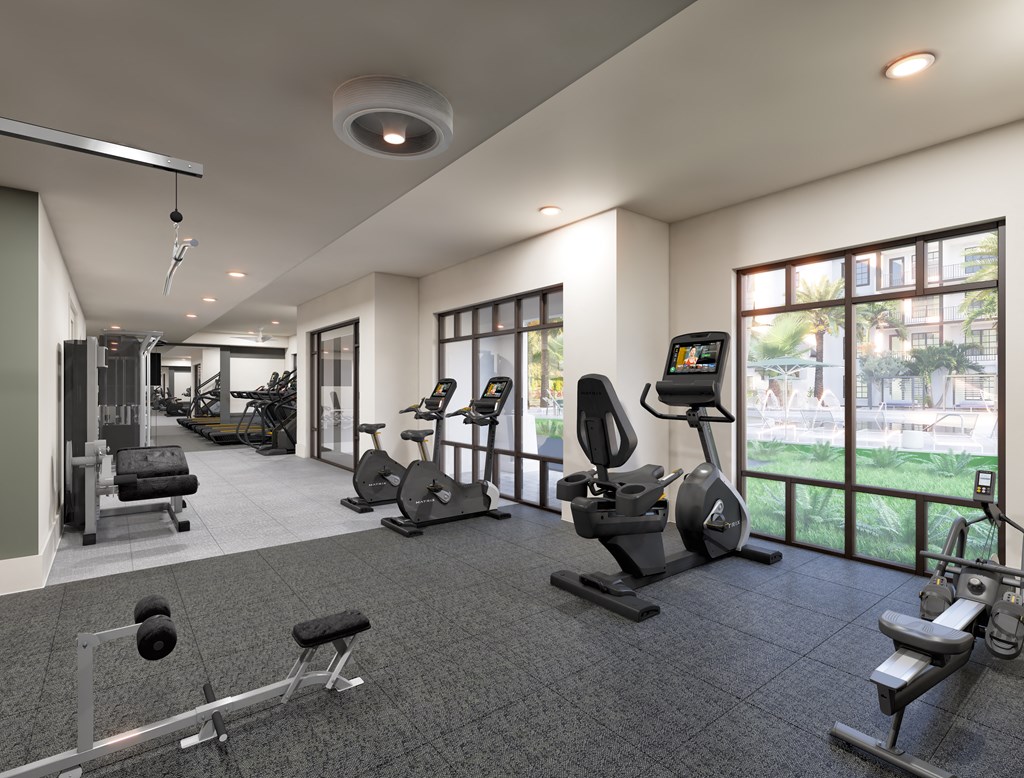 a rendering of a gym with cardio equipment and windows