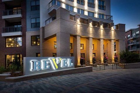 Night view of the exterior entrance sign to Revel Ballpark in Atlanta, GA