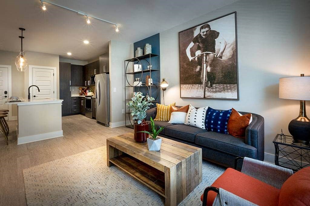 Living room with a couch, chair and coffee table.
