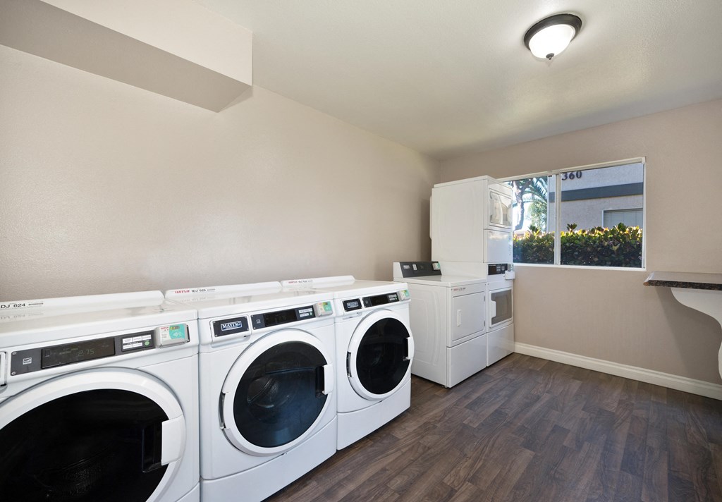 the preserve at ballantyne commons laundry room with washer and dryer