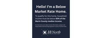 A sign advertises a Below Market Rate Home, requiring household income to be below 50% of the Marin County median income.