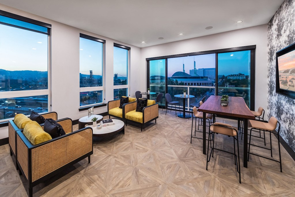 Resident lounge with chairs, table, and stunning panoramic views