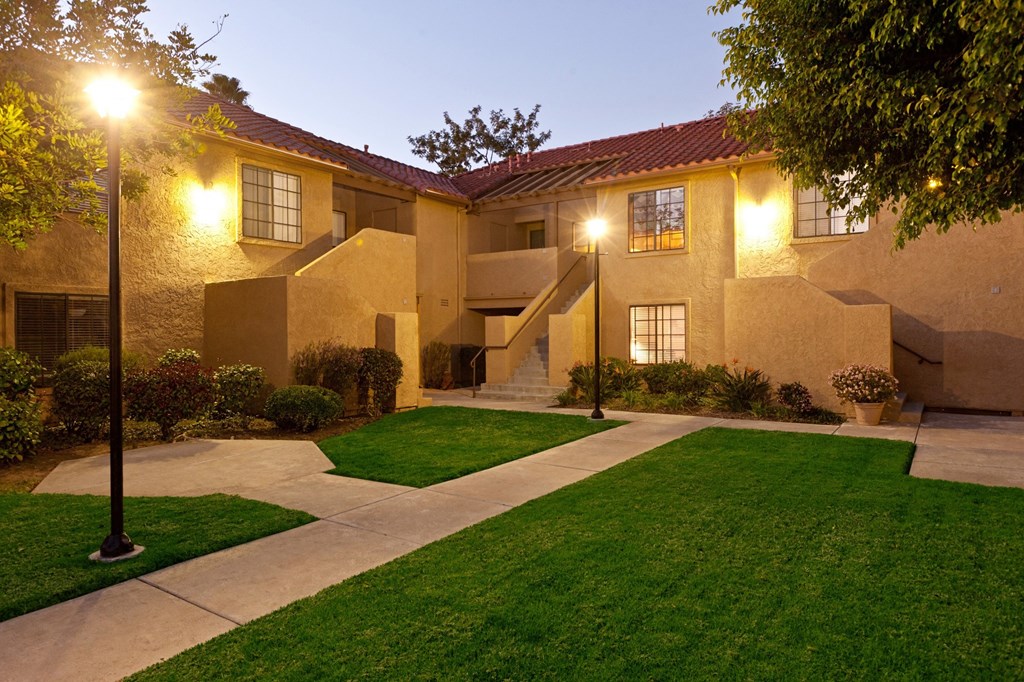 a night time view of the front of the house