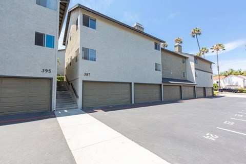 a row of garage doors on the side of a building
