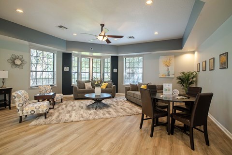 A common room with a table and chairs.