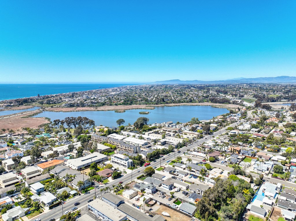 an aerial view of a city and a body of water