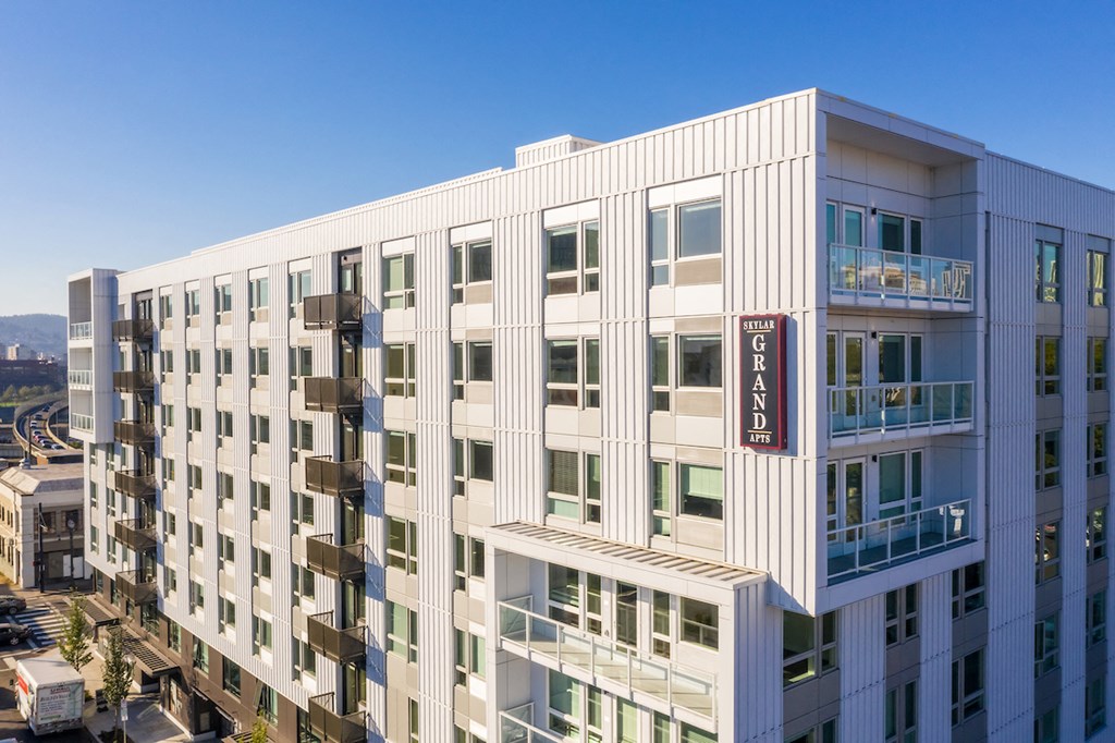 Skylar Grand building exterior with monument sign and balconies in view