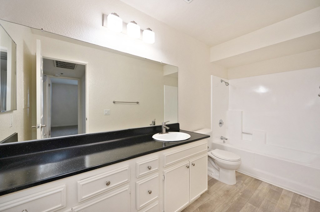 the preserve at ballantyne commons apartment bathroom with sink and toilet