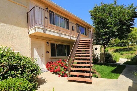 The exterior of Park Sorrento's apartments with stairs leading to the apartments