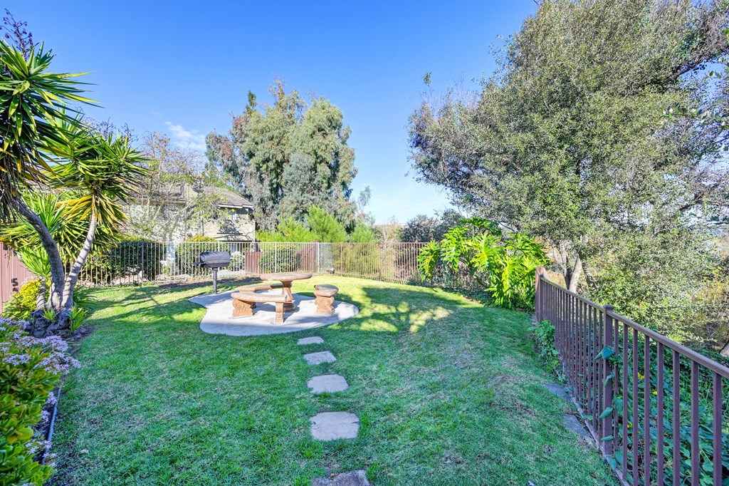 Lush courtyard with bbq area