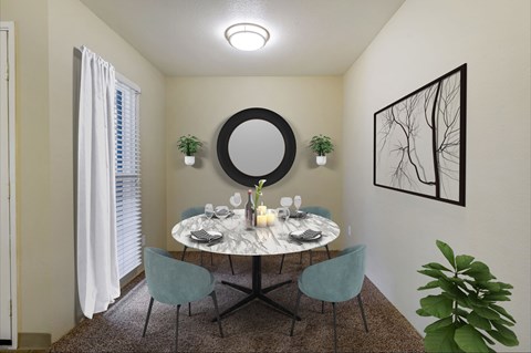 Dining room with overhead light and sliding glass door to balcony.