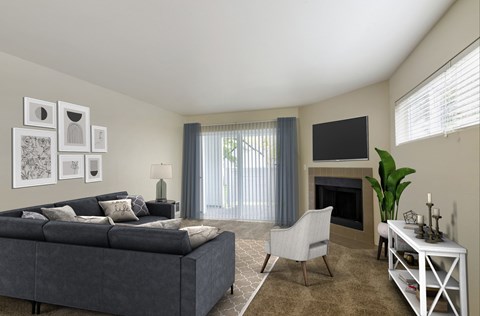 Living room with fireplace and sliding glass door to balcony.