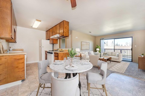 An overview of the classic interiors dining room, kitchen, and living room.