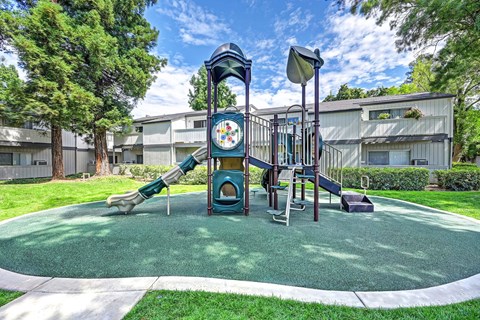 The playground at The Redwoods with slides.