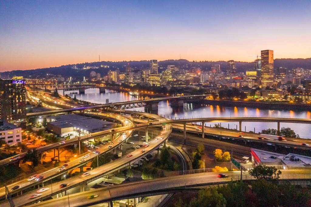 Dusk view of Burnside Bridge and highways from Skylar Grand Apartments in Portland, Oregon