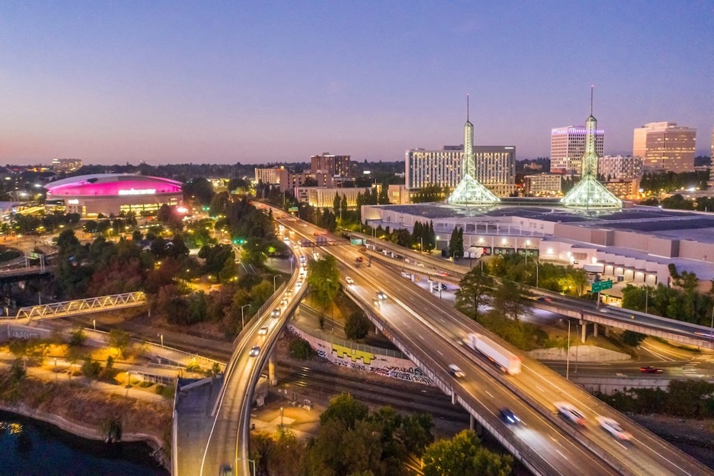 View of highways and Portland Convention Center at dusk from Skylar Grand Apartments in Portland, Oregon