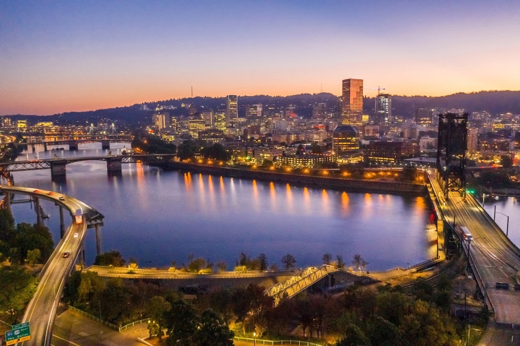 View of steel bridge and river from Skylar Grand Apartments in Portland, Oregon