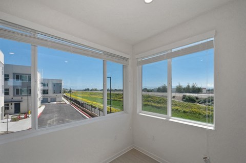 Beautiful panoramic view out of a River Gate Townhomes corner home.
