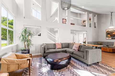 Clubhouse loft with couch and table.