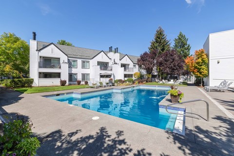 Pool with view of community exterior.
