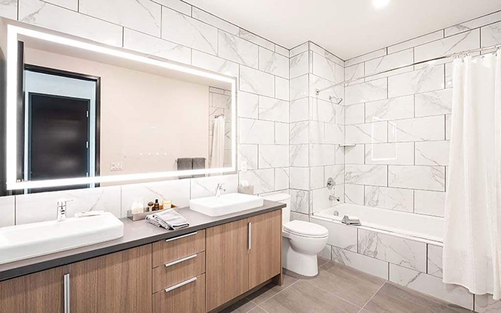 a bathroom with a toilet sink and bathtub