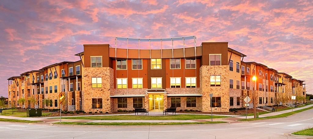a building at sunset with the sky in the background at Urban Square, Denton, 76210
