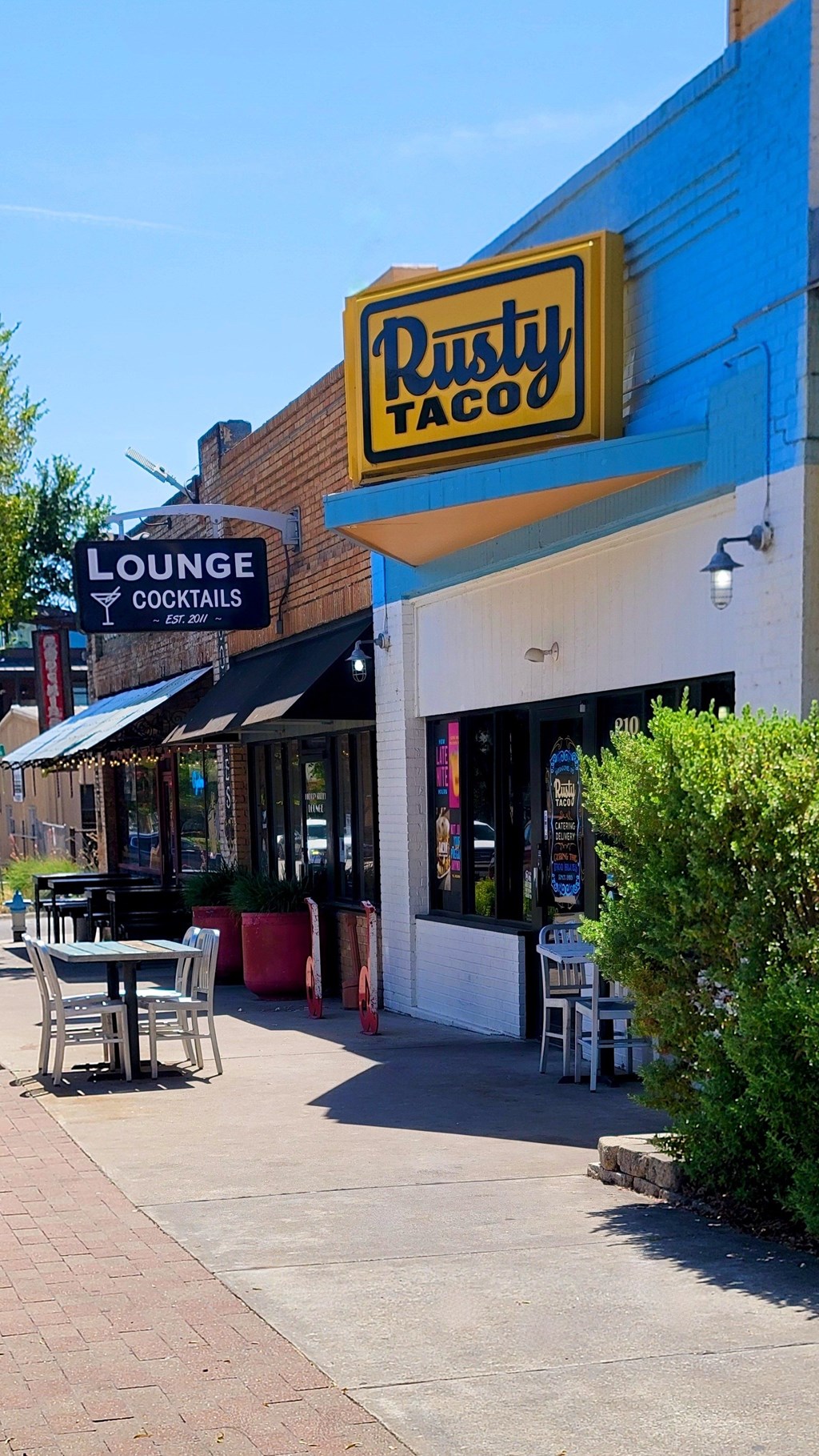 A Rusty Taco restaurant with a lounge area for cocktails.