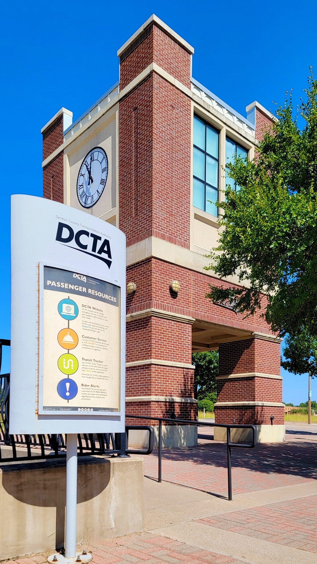 A sign in front of a building with the letters DCTA on it.
