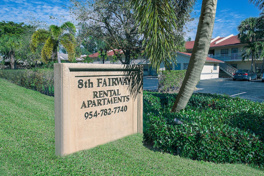 Sign of 8th Fairway Apartments