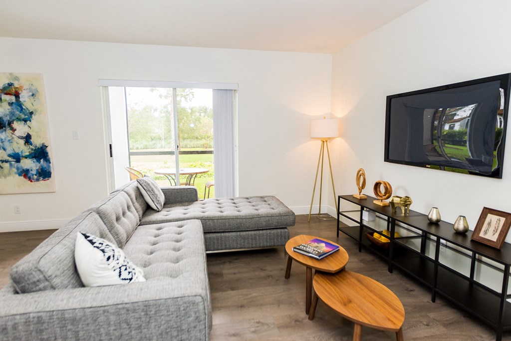 a living room with a couch and a television