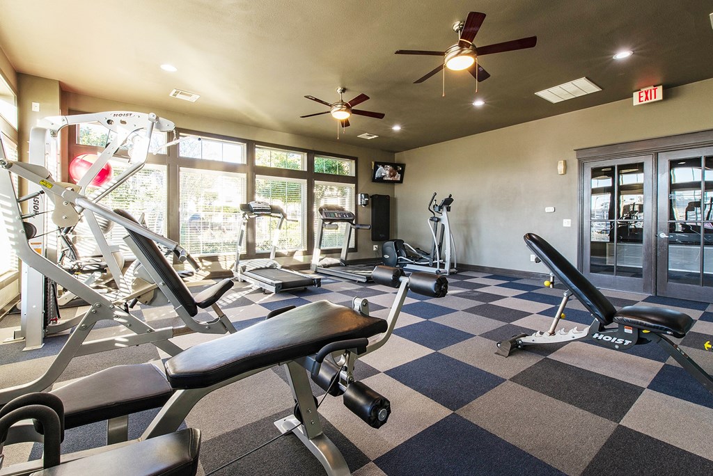 the gym at the at the boulevard apartments in