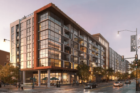 A modern building with a lot of windows is shown.