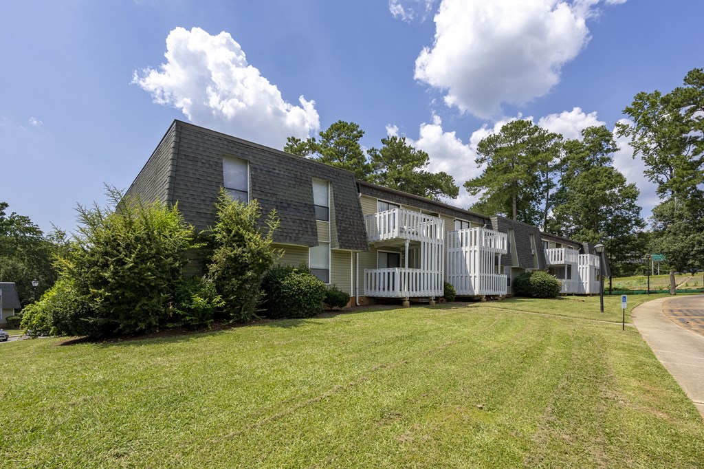 A modern house with a grey roof and white walls at Peachtree Place Apartments, South Carolina