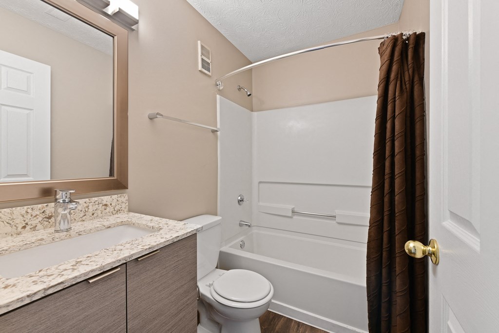 Renovated Bathroom with Granite Countertops at Patchen Oaks Apartments, Lexington, Kentucky 40517