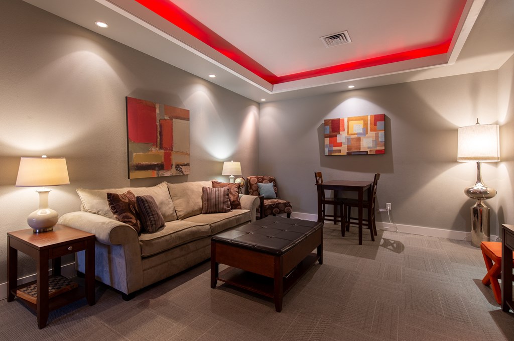 a living room with a couch and a table