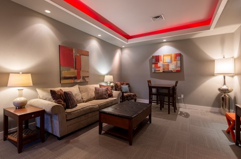 a living room with a couch and a table at Corso Apartments, Missoula, MT