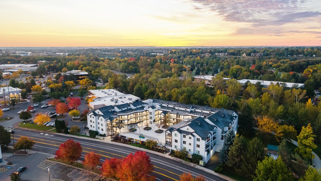 an aerial view of an apartment building in the city