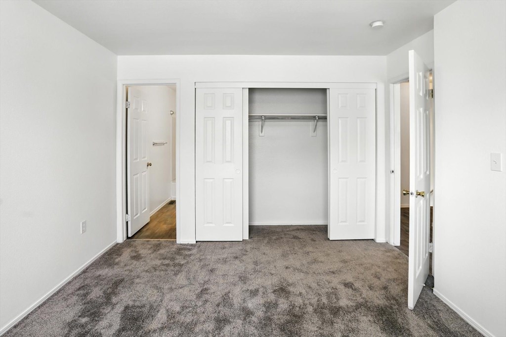 Bedroom With Closet at Oakstone Apartments, Clearfield, Utah