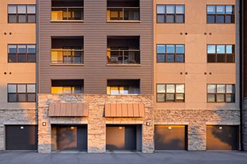 an exterior view of an apartment building with doors and windows at Avenue C Apartments, Billings