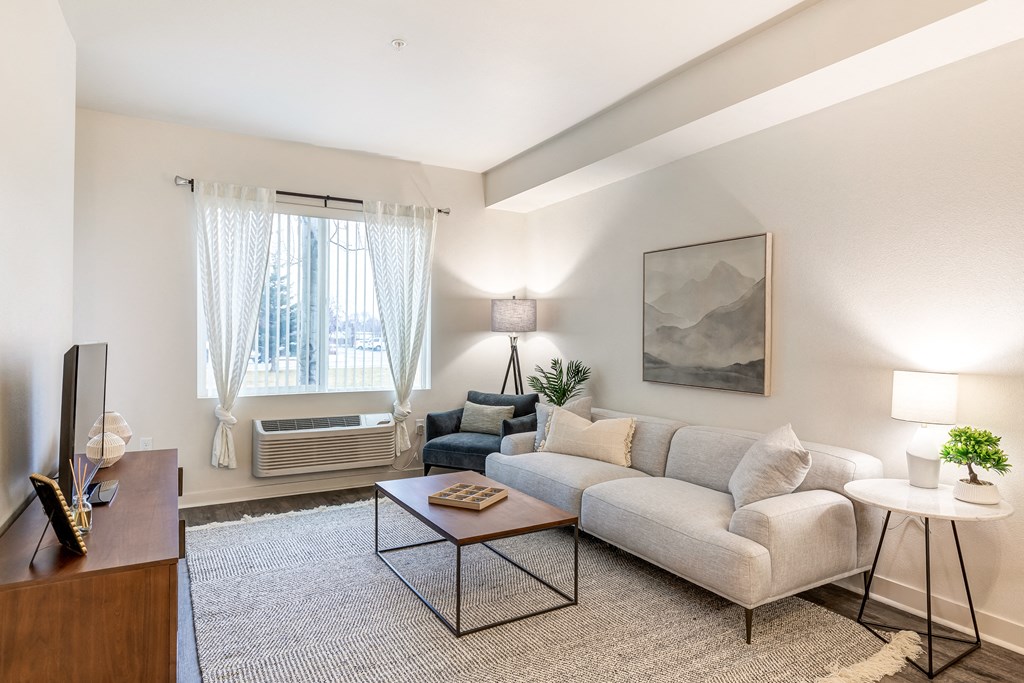 a living room with a couch and a coffee table